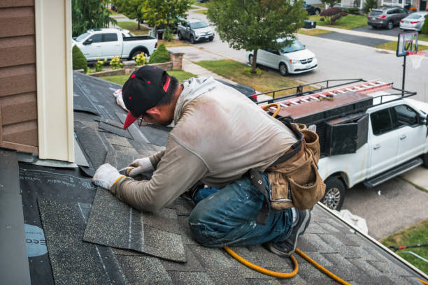 Professional Roof Replacement technician working in Columbia, CT
